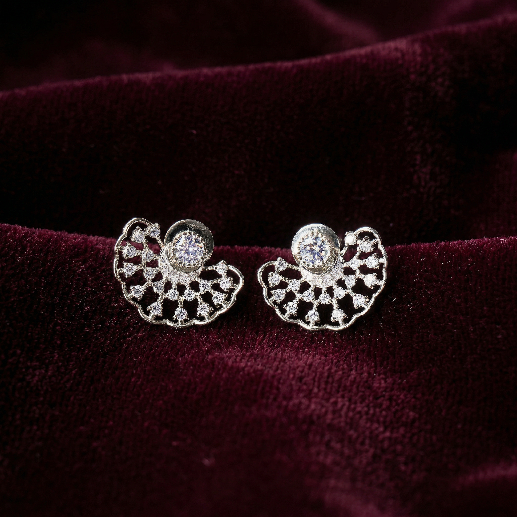 Silver fan shaped designer earrings